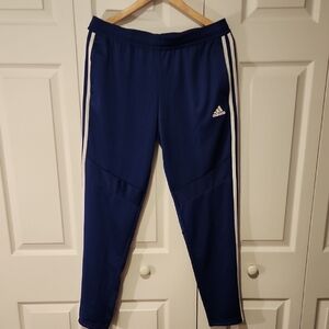 Adidas Women's Blue Joggers with White Stripes